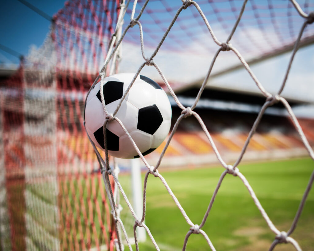 soccer-into-goal-success-concept