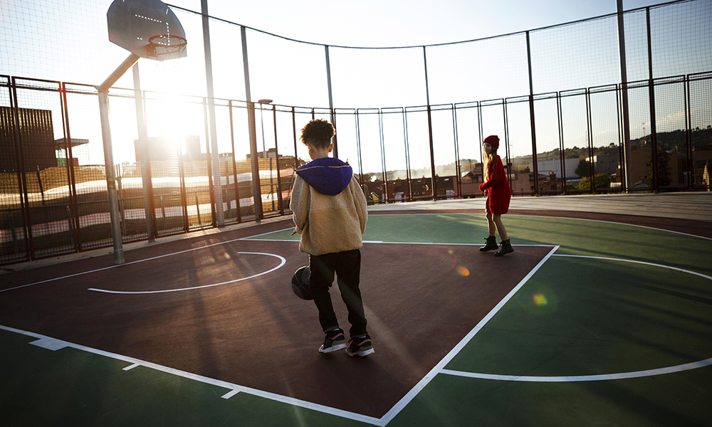 children-playing-basketball-field